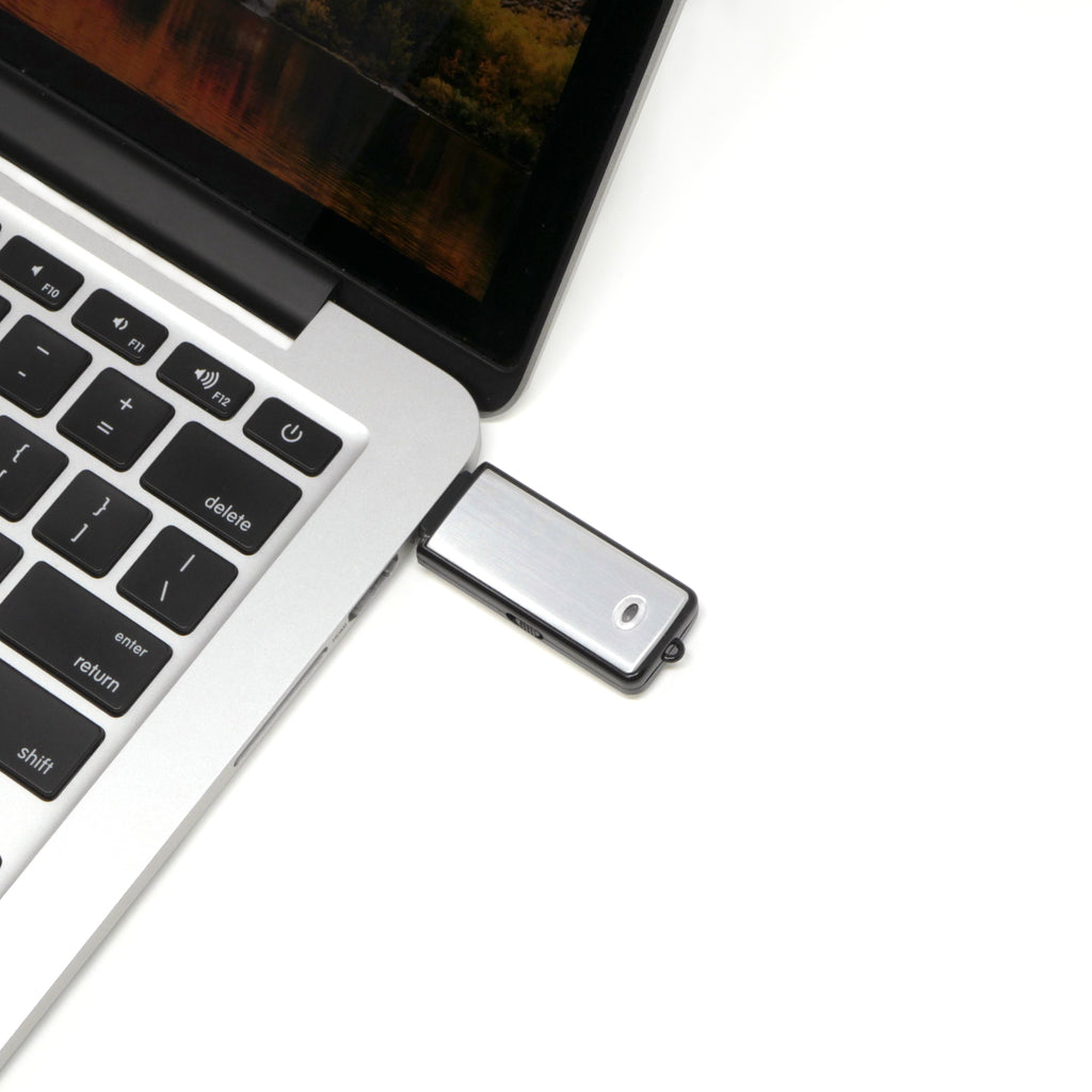USB Flash Drive Audio Recorder Plugged Into Laptop