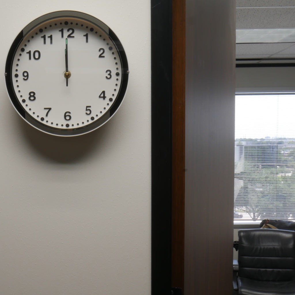 Wall Clock Speaker Camera in Office